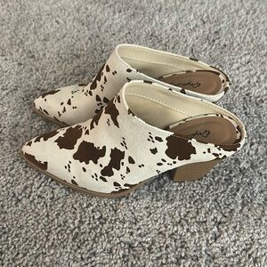 Cow print mule block heels (slip-on). Worn briefly bought from a boutique.